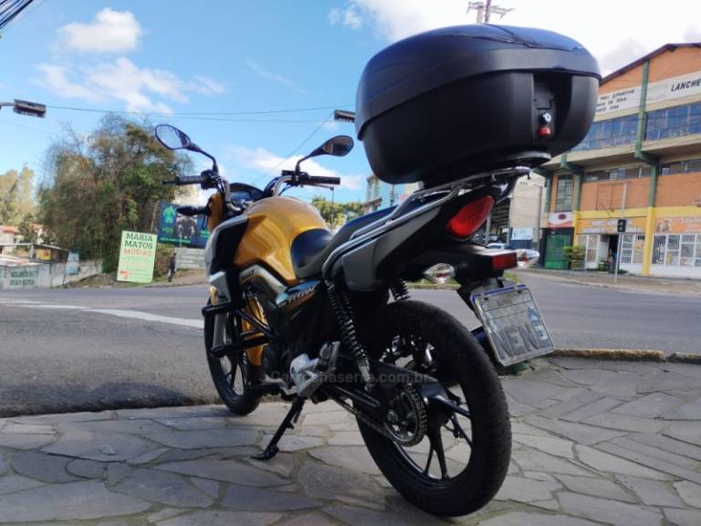 HONDA - CG 160 - 2021/2022 - Amarela - R$ 17.500,00