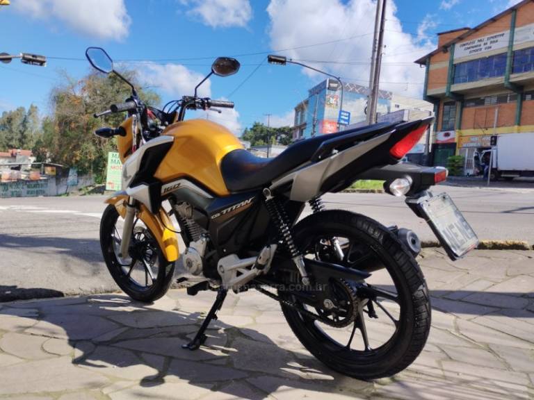 HONDA - CG 160 - 2021/2022 - Amarela - R$ 17.500,00