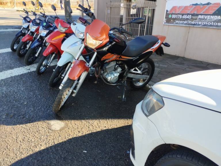 HONDA - NX4 FALCON - 2006/2007 - Laranja - R$ 17.500,00